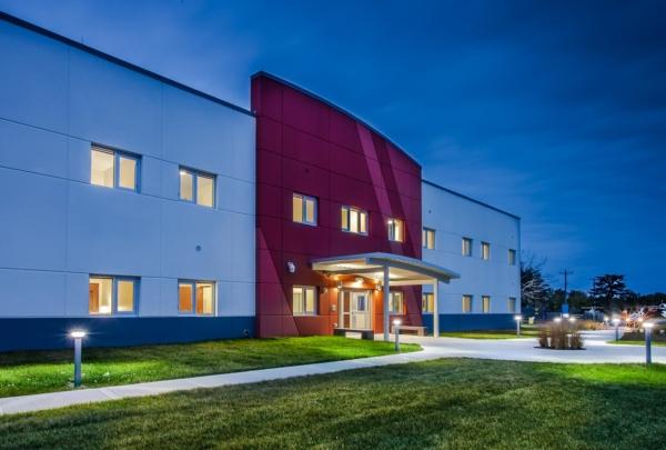 Nighttime photo of Cape Cod UPH building exterior